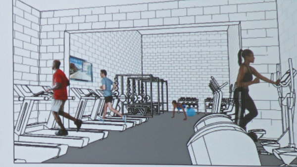 Fitness area now ends at wall that will be opened into old restroom area.