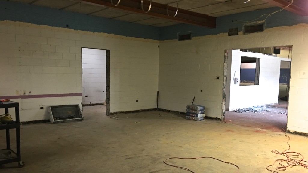 From the back of the Forum's old meeting area, foyer is on right, entryway to kitchen at left.
